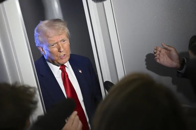 President Donald Trump speaks to reporters while in flight on board Air Force One, en route to Miami on April 3, 2025.